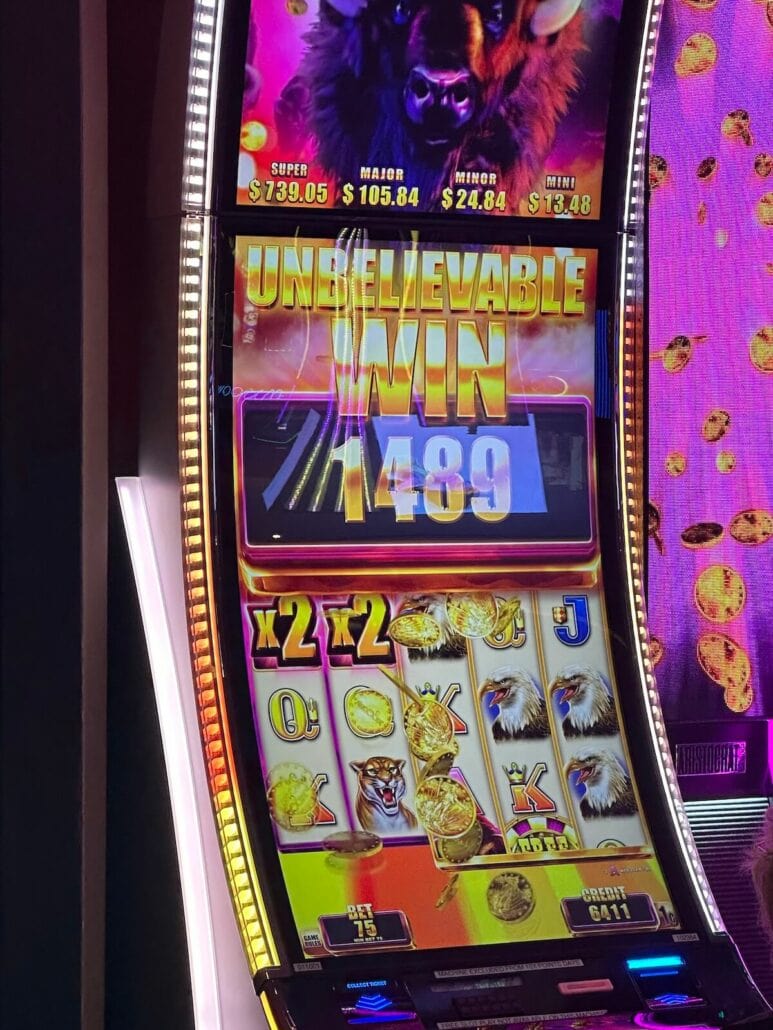 A slot machine with a bull on it features a chance to win a free cruise.