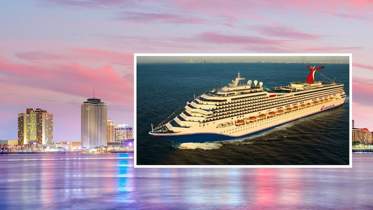 A cruise ship on open water juxtaposed against a skyline at sunset with illuminated buildings reflecting on the water.