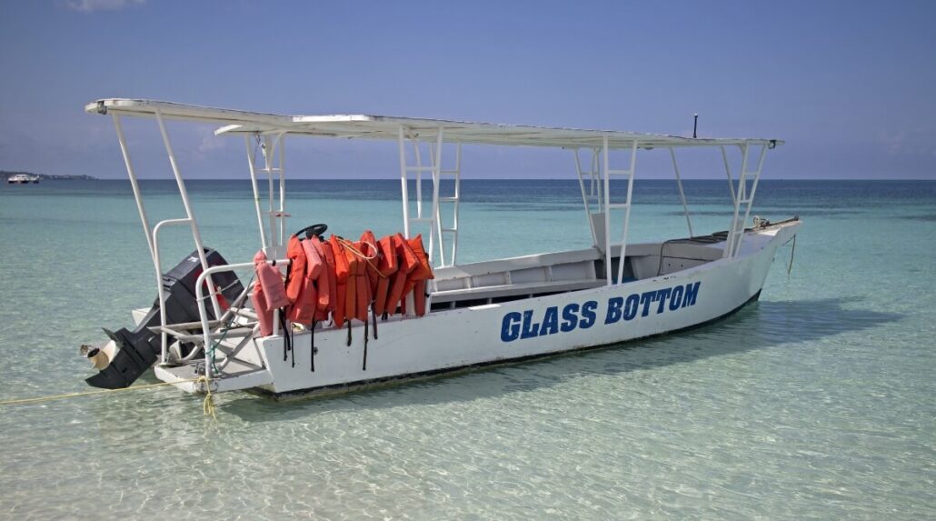 A white boat labeled 